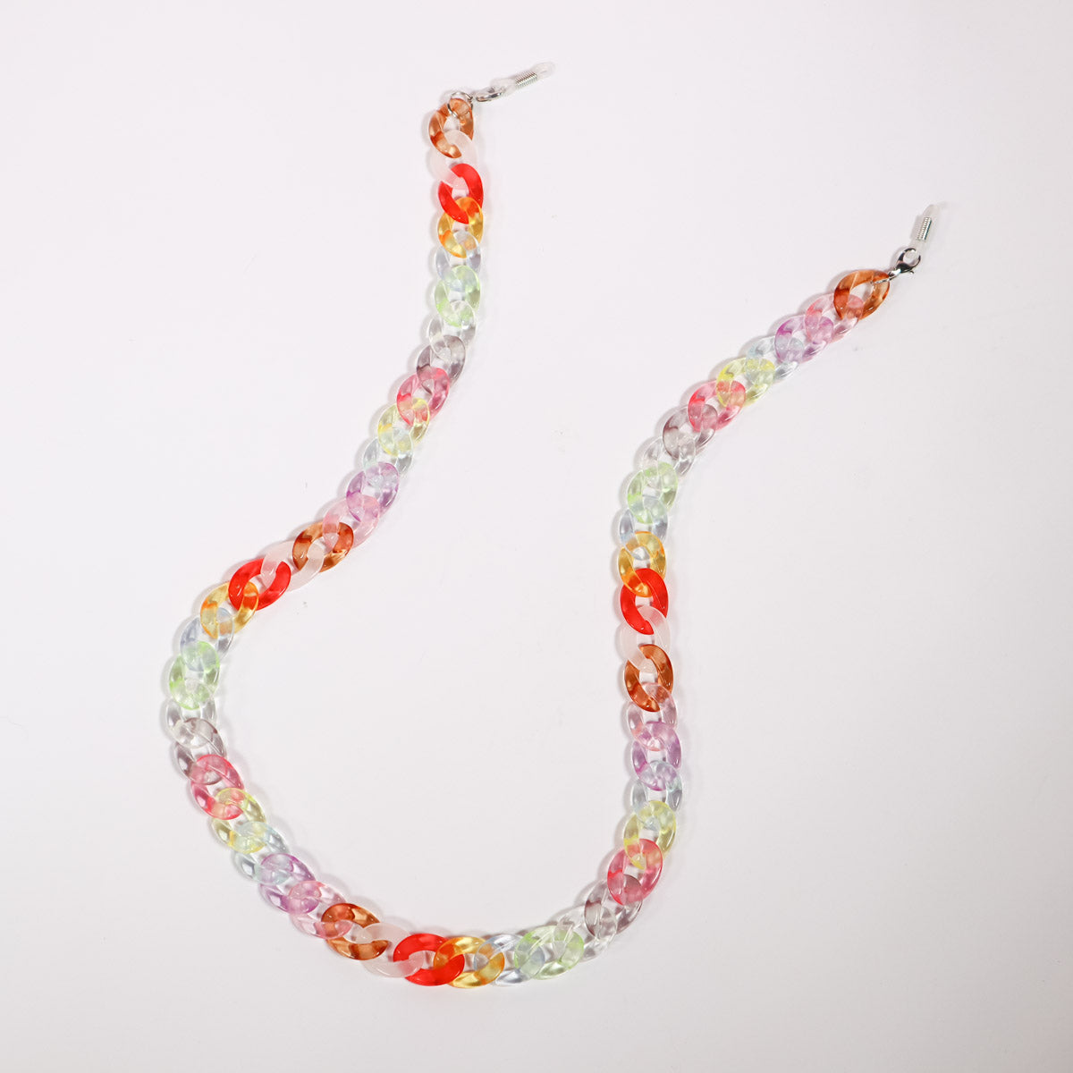 Flat lay of bright candy coloured glasses chain.