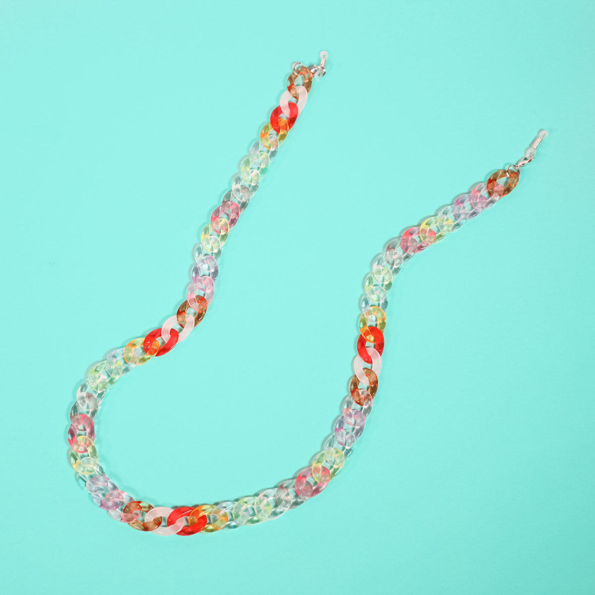 Flat lay of multi coloured chain link glasses chain.