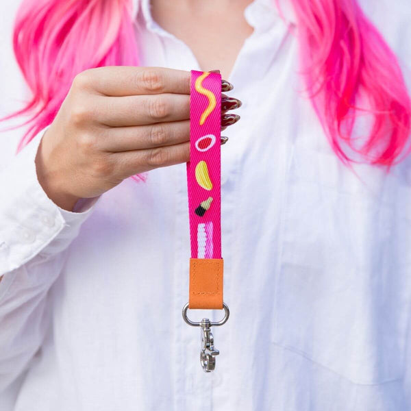 Lolly Jar Pink Wristlet Keychain by Teggun Ashleigh worn on the wrist