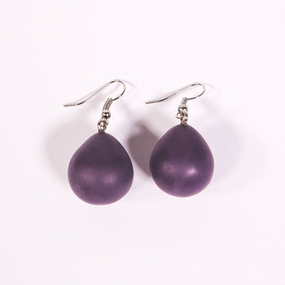 Purple everyday drop earrings on a white background. 