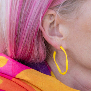 RO20-MEGANS-PHOTOSHOOT-MEGAN-YELLOW-HOOP-CLOSE-UP.jpg