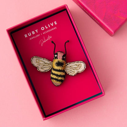 Bumblebee brooch in a decorated pink box.